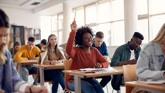 Students in an English language class at UK Guardians, focused on immersive learning and improving communication skills.